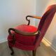 Antique armchair in burgundy velvet