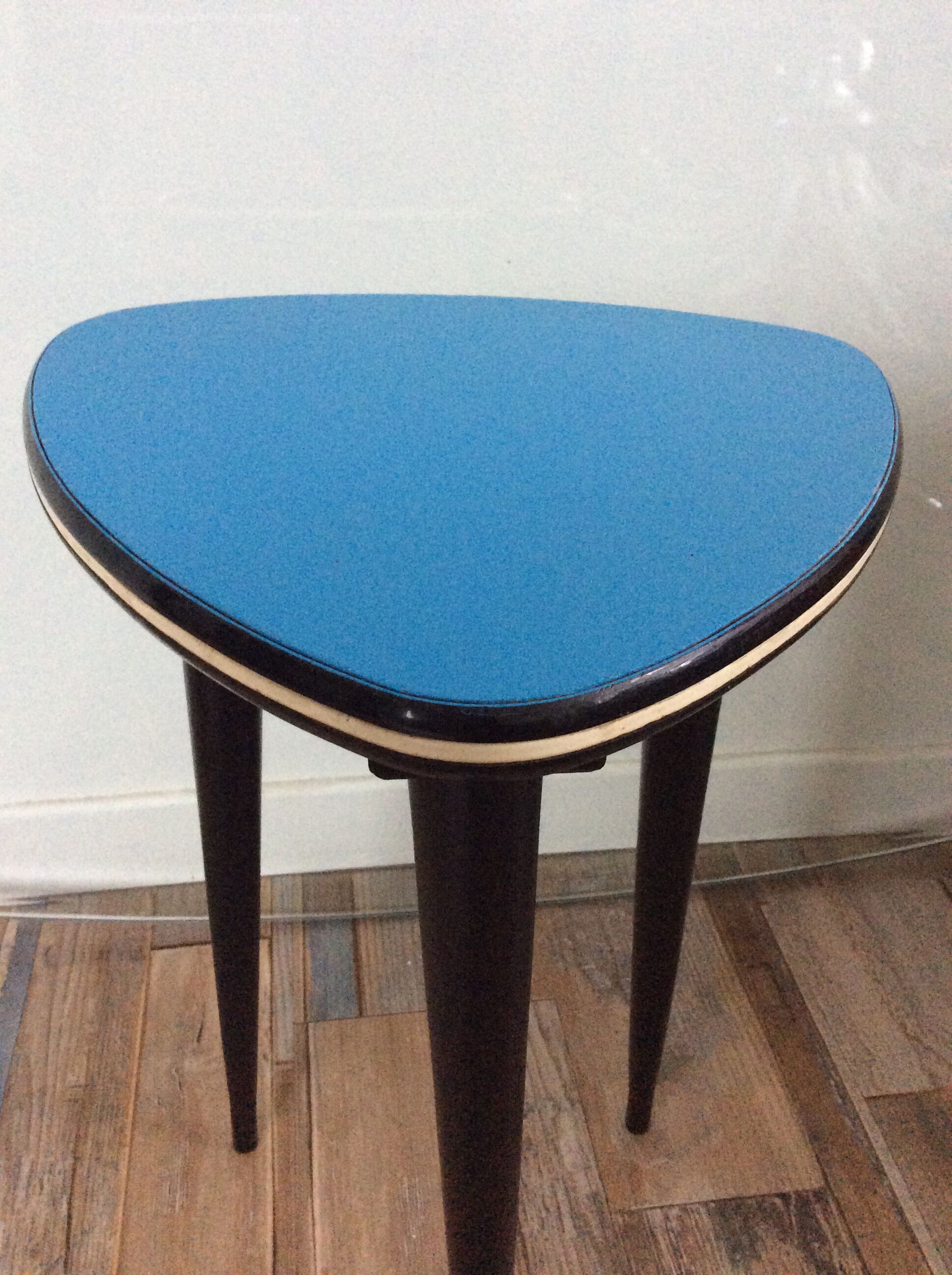 Asymmetrical pedestal table tripod feet from the 60s