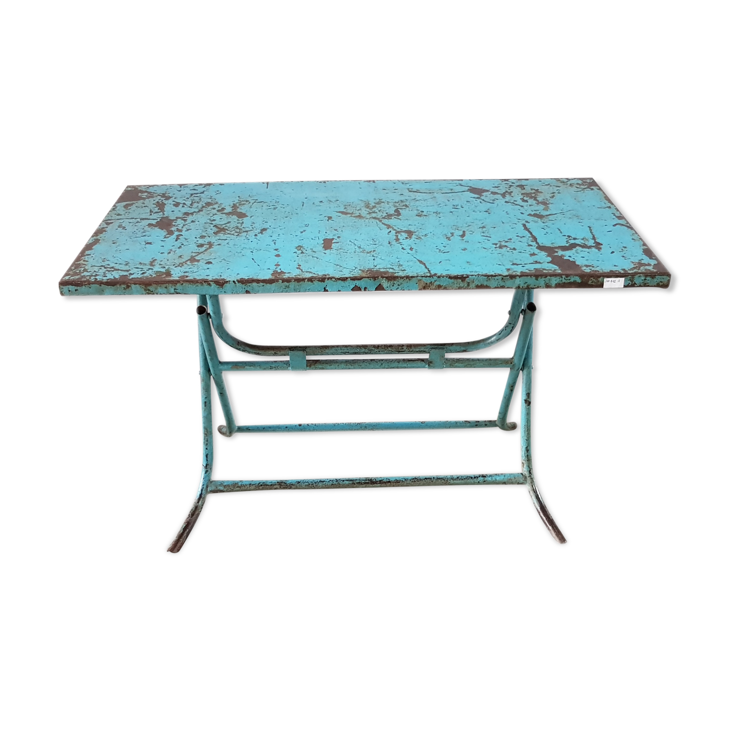 Old metal folding table with its original turquoise patina
