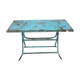 Old metal folding table with its original turquoise patina