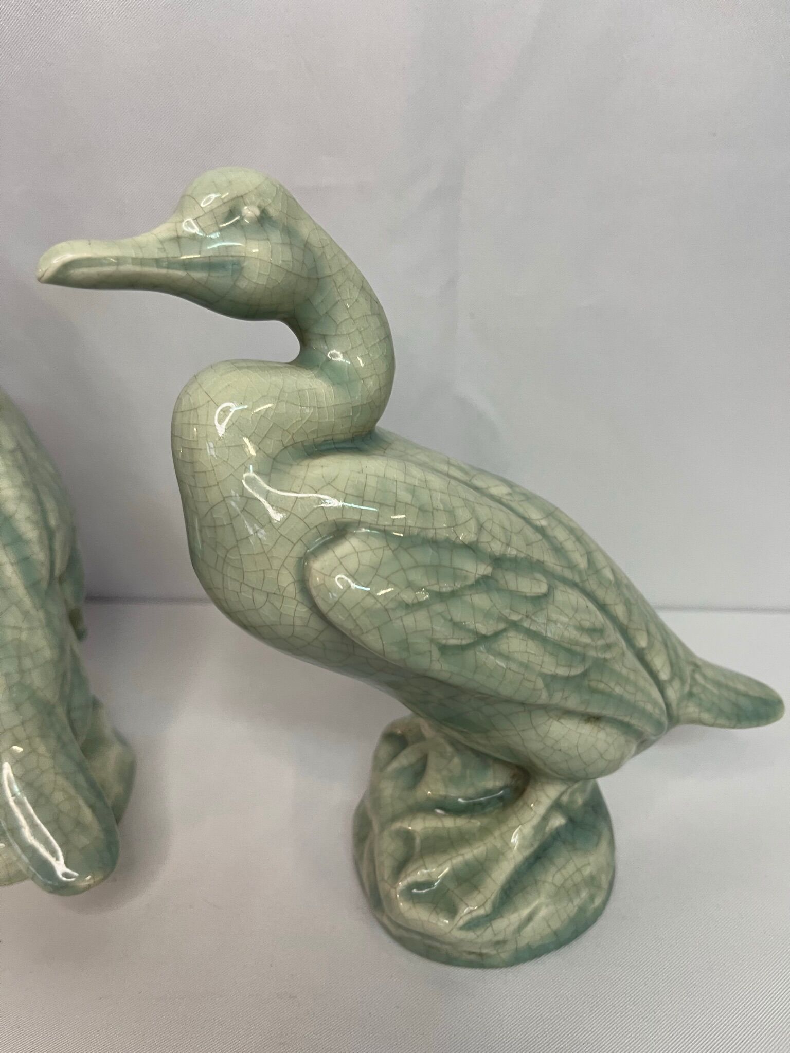 Art Deco Pair cormorants cracked ceramic signed circa 1940