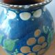 Pair of Primavera vases in blue ceramic with plant decoration 1920-1930