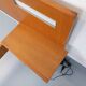 Double bed in vintage Scandinavian style from the 1960s with bedside tables.