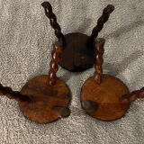 Wooden tripod stool with twisted legs