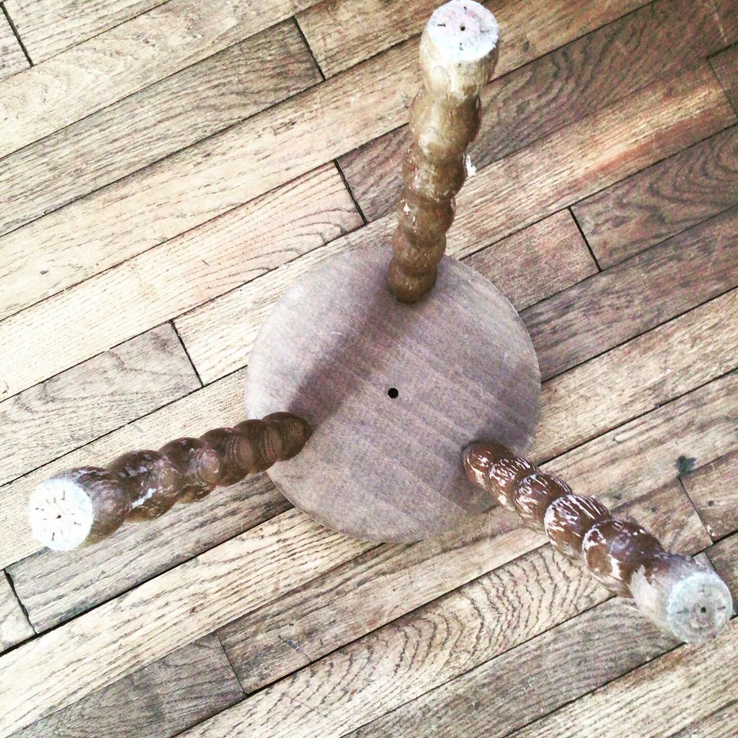 Turned wooden milking stool