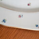 Oval dishes in floral porcelain and gold