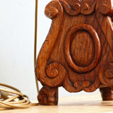 Carved wooden lamp, fiber shade