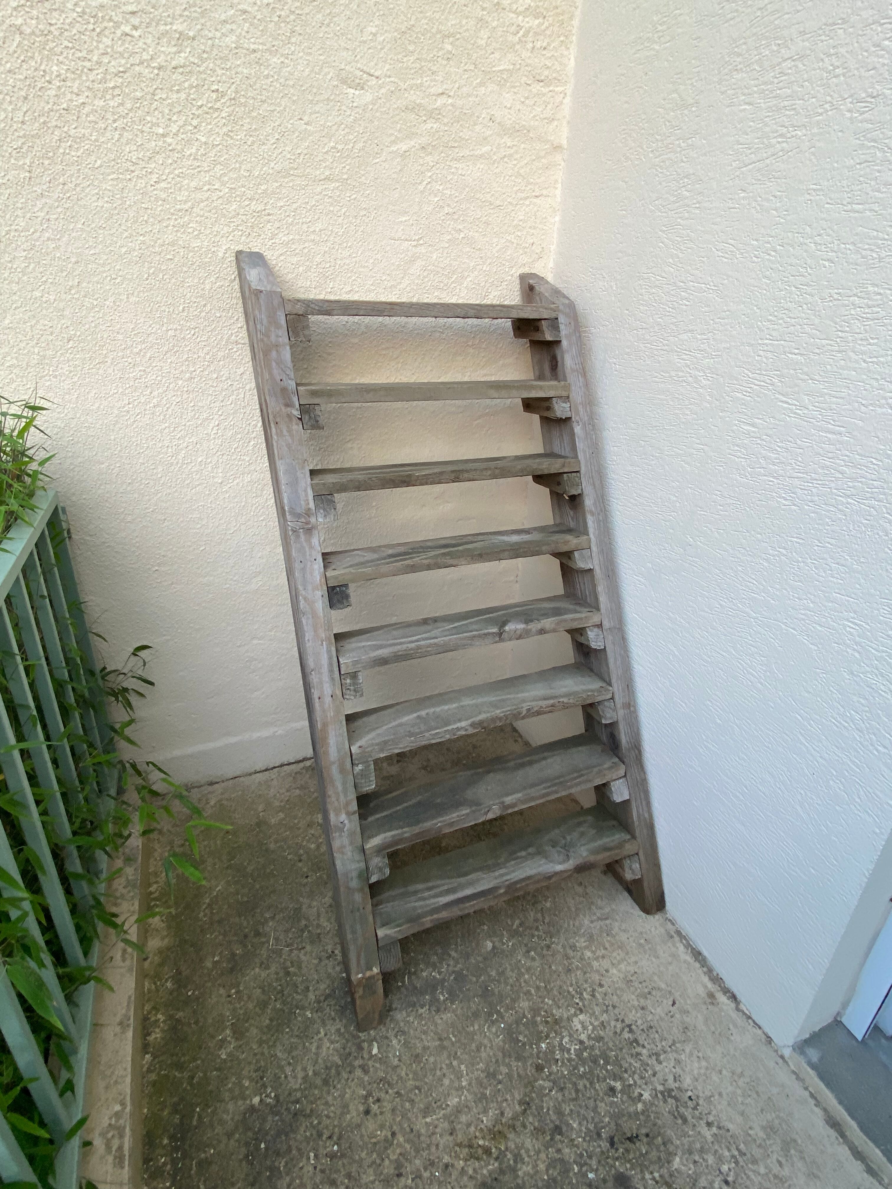 Workshop staircase in vintage raw wood