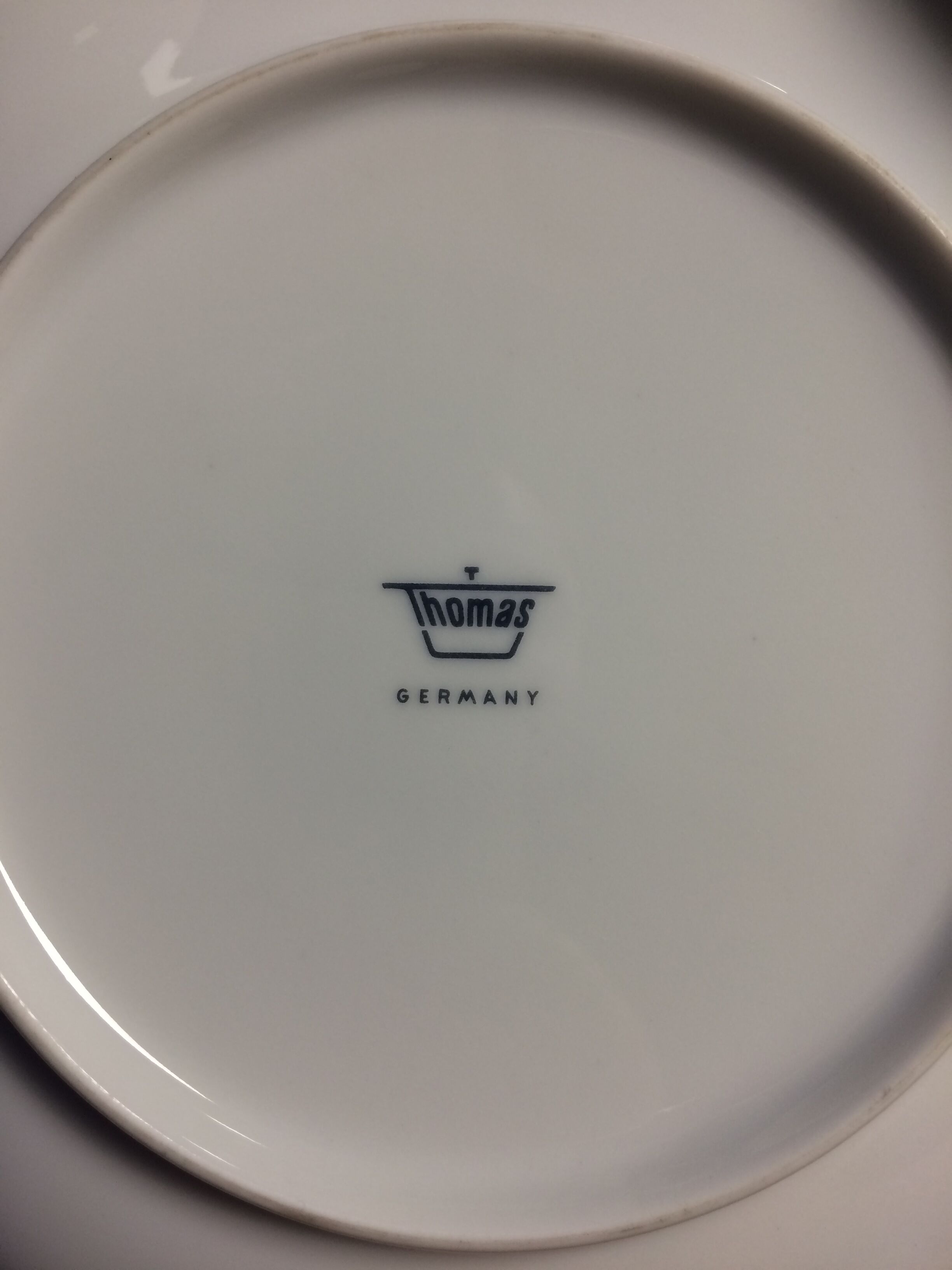 Pair of white porcelain cups and saucers