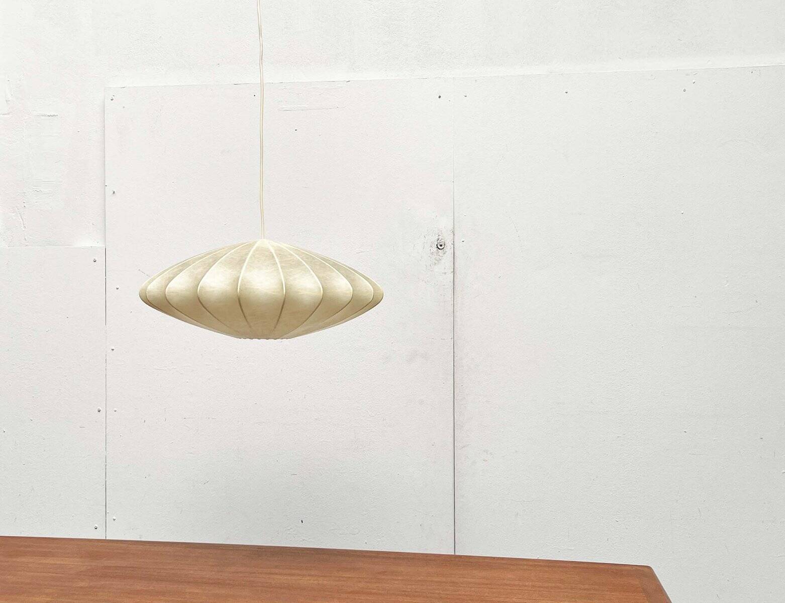 Modern UFO disc cocoon pendant lamp from the mid-century by Friedel Wauer for Goldkant Leuchten, Germany, 1960s.