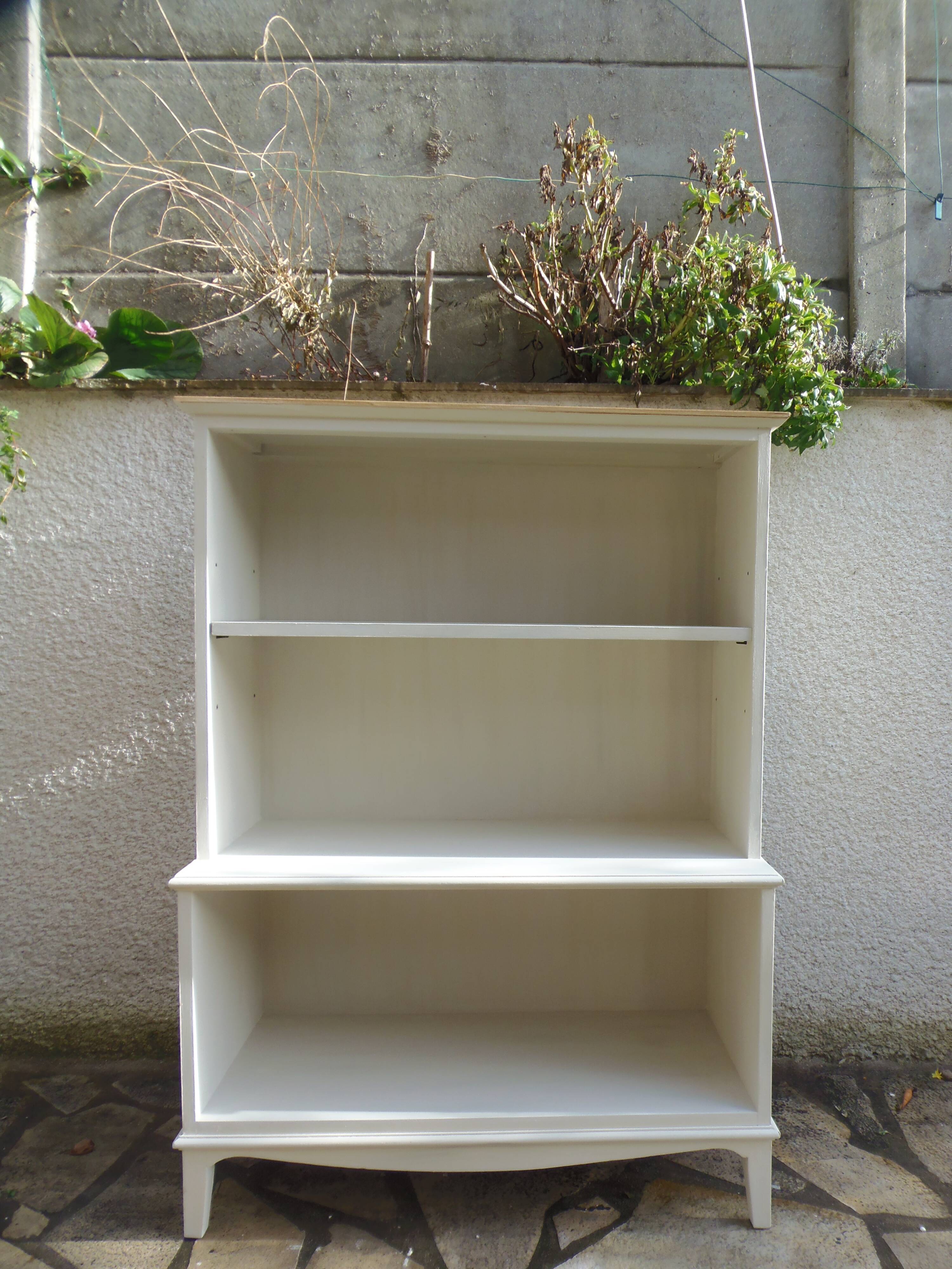 Vintage library enhanced in beige, wooden top.