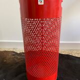 Vintage red umbrella holder in 80s perforated sheet metal or Italy trash can