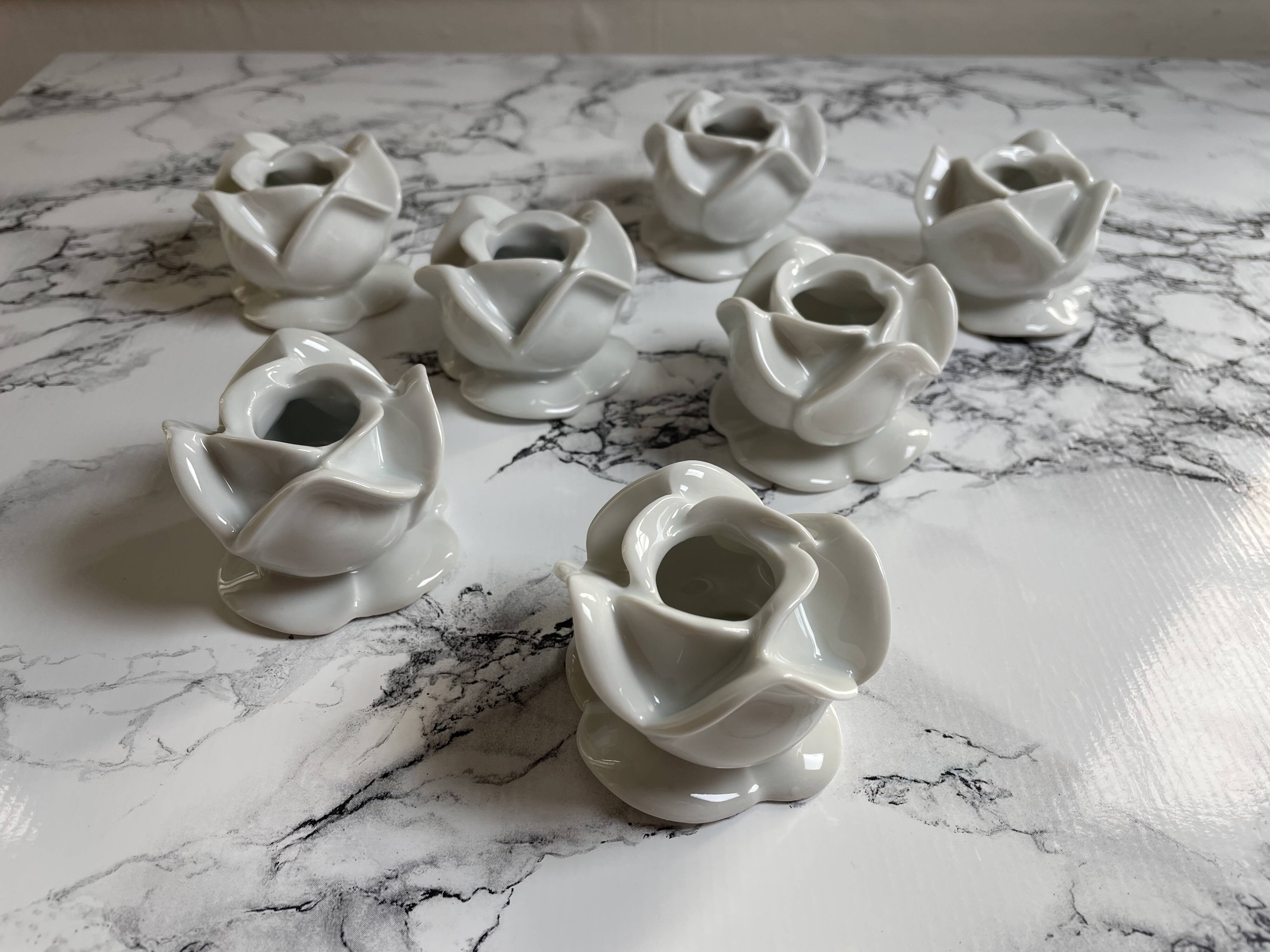White porcelain rose shaped candle holders