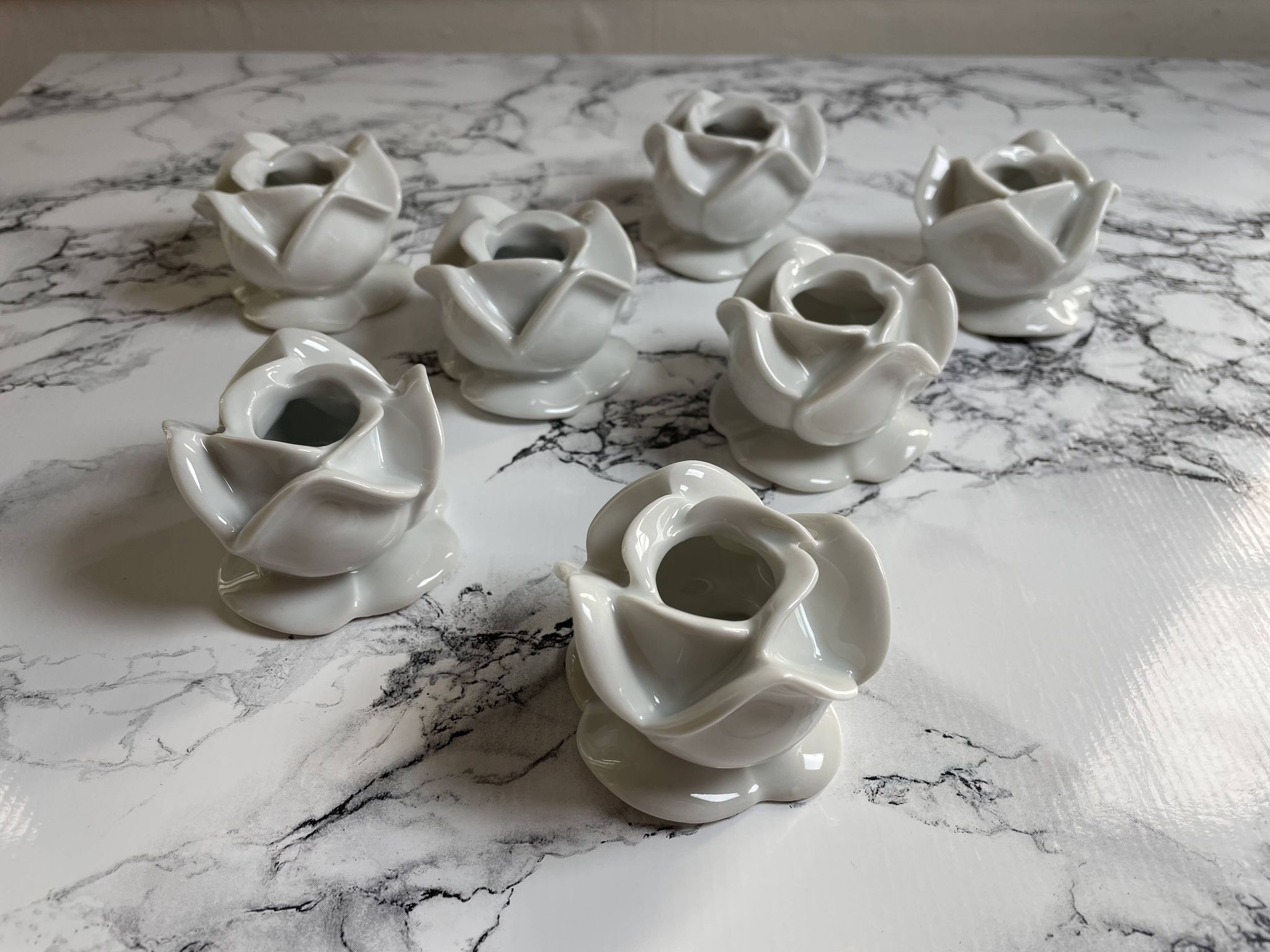 White porcelain rose shaped candle holders