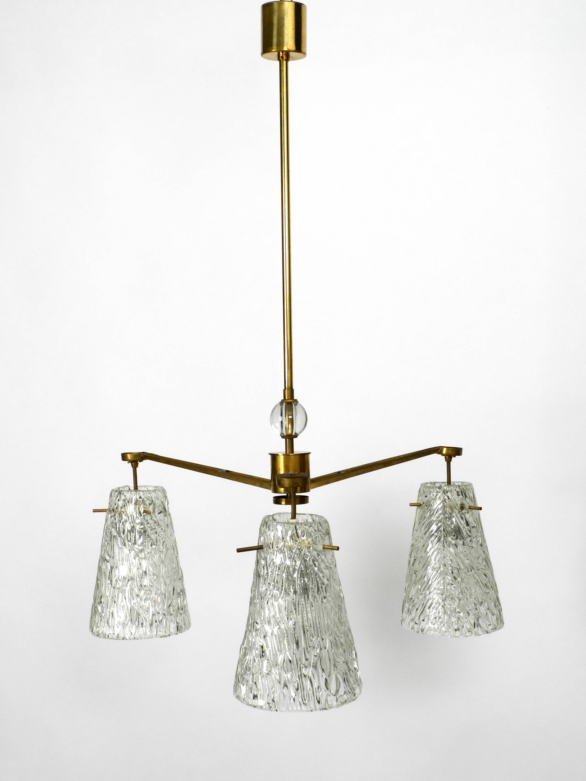 Heavy Mid Century ceiling lamp with three glass shades by Rupert Nikoll