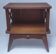 vintage wooden bedside table with crossbars and tapered legs