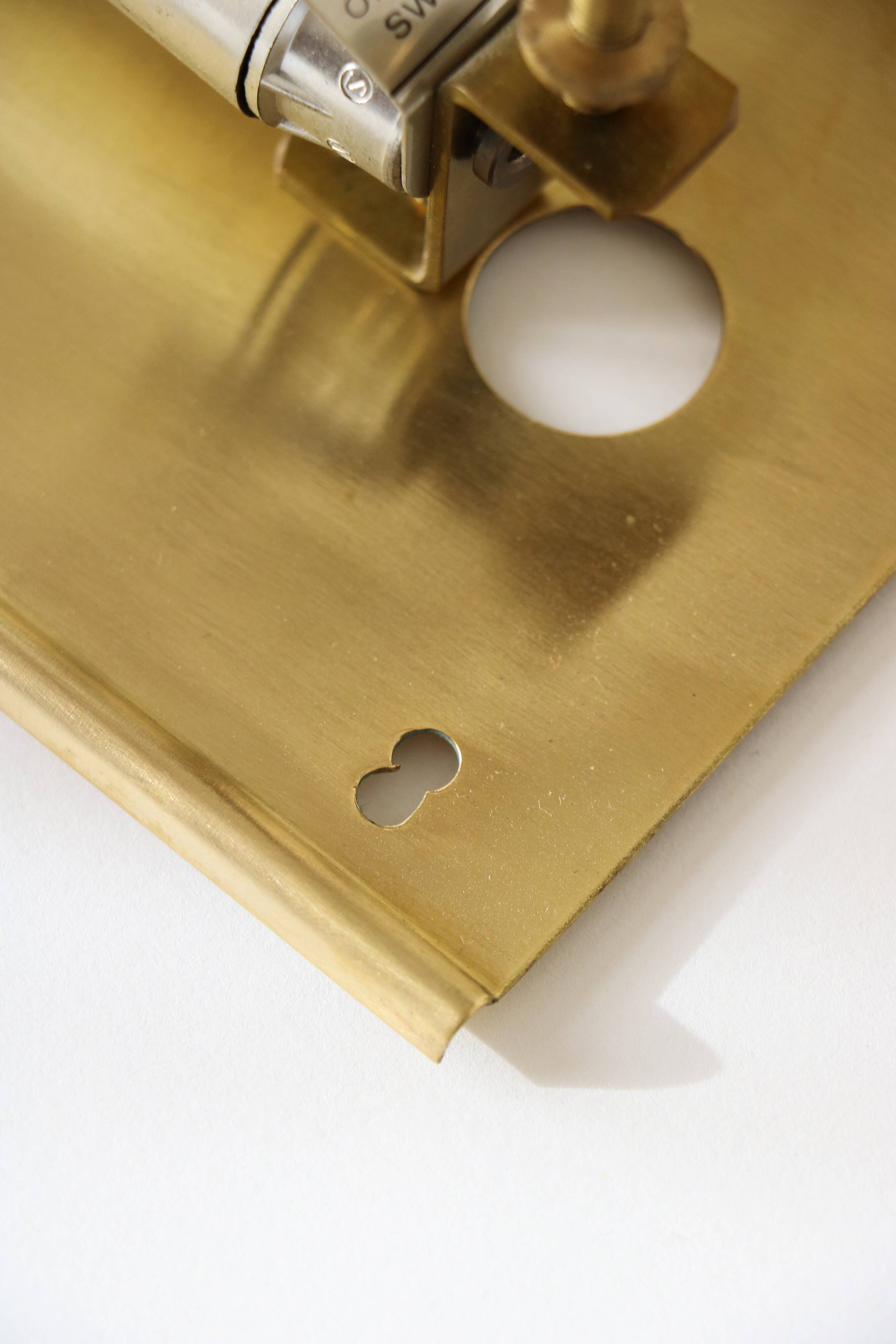 Glass and brass wall light by Carl Fagerlund for Orrefors, 1960.