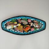 Dish with fish and shells relief decoration