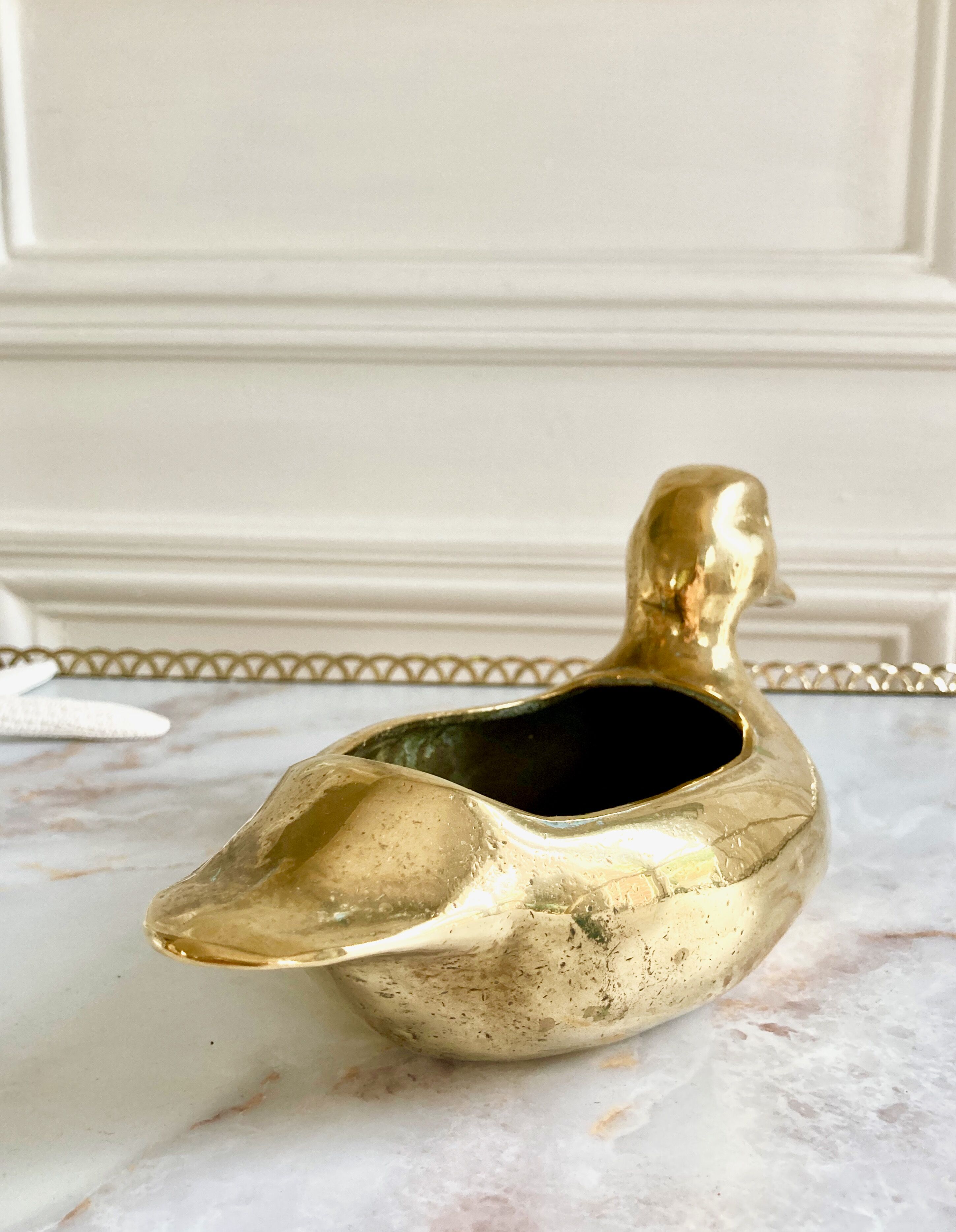 Empty solid brass duck pocket