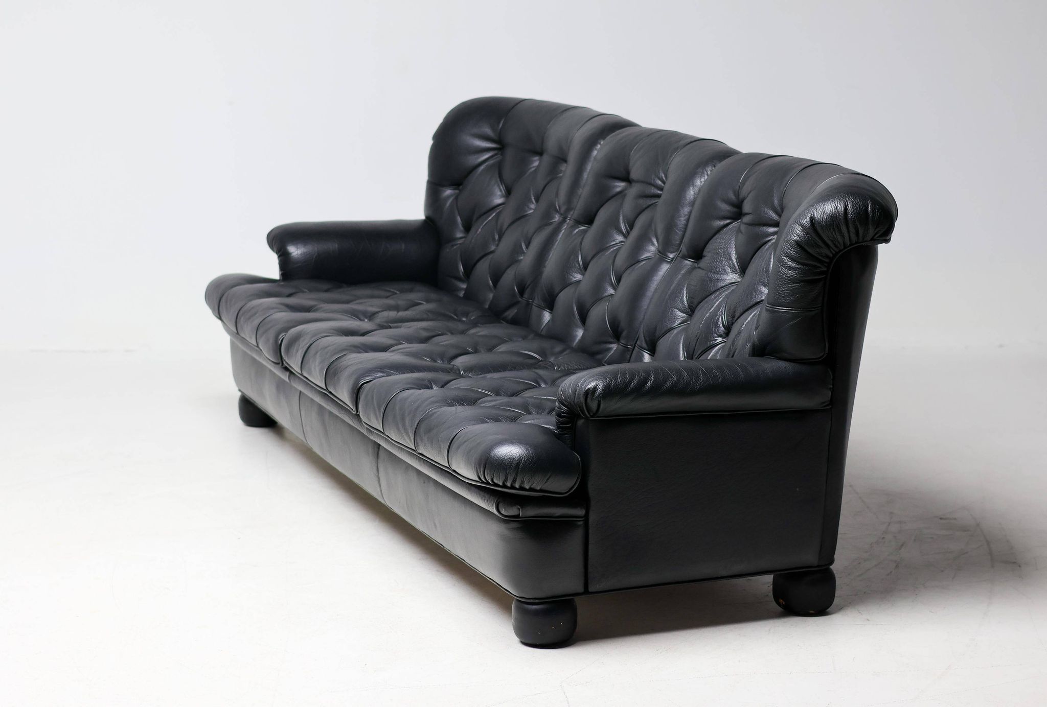 Three-seater sofa "Jupiter" in black leather by Arne Norell, Sweden, 1960.