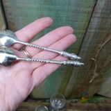 Set of 2 souvenir spoons in silver metal