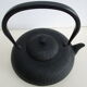 Asian teapot in black cast iron
