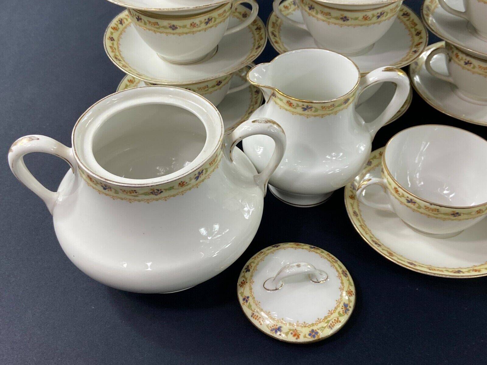 Limoges porcelain tea set Bernardaud Teapot sugar bowl milk pot cups