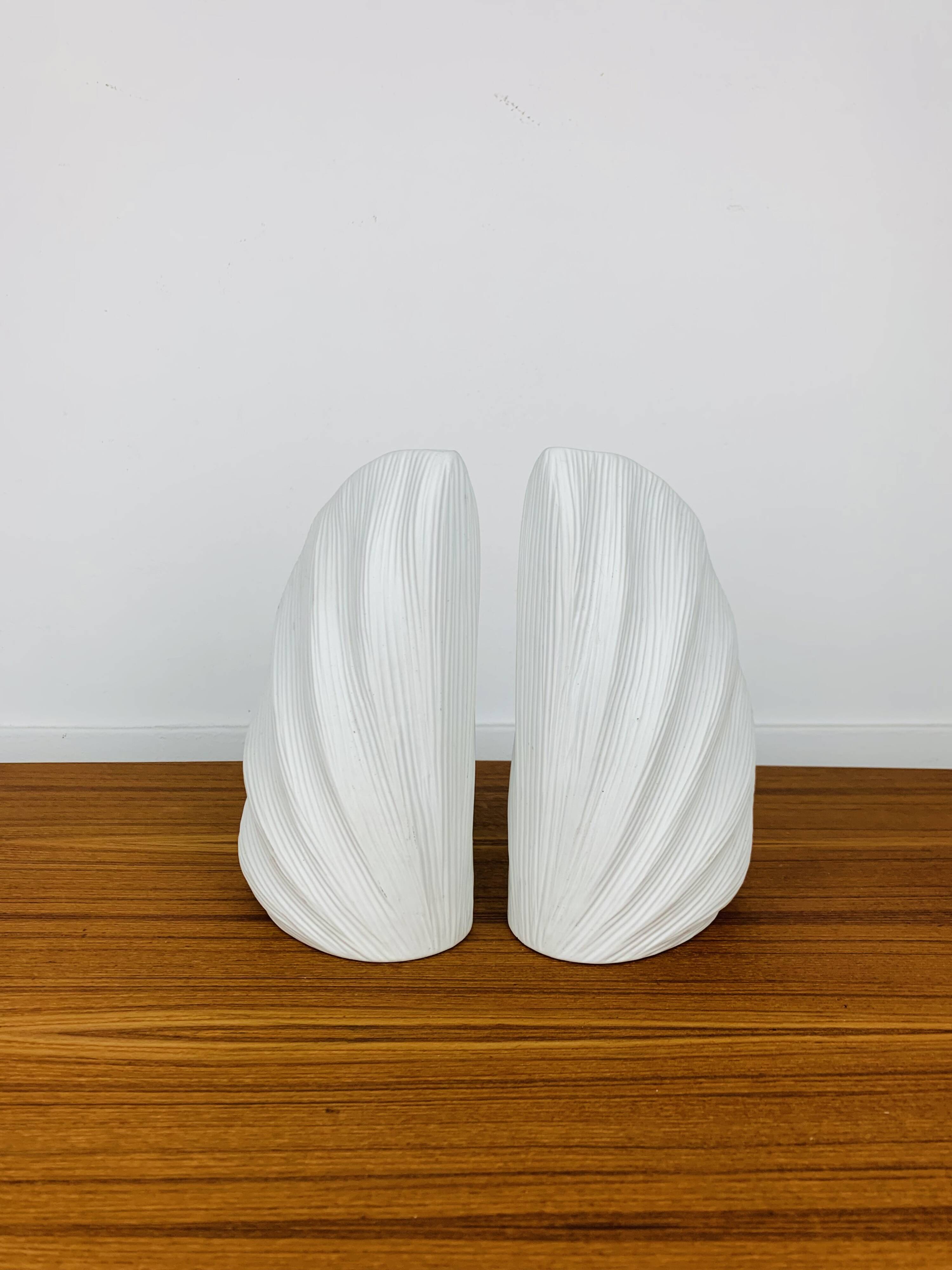 Pair of white ceramic coral vases, bookends