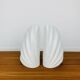 Pair of white ceramic coral vases, bookends