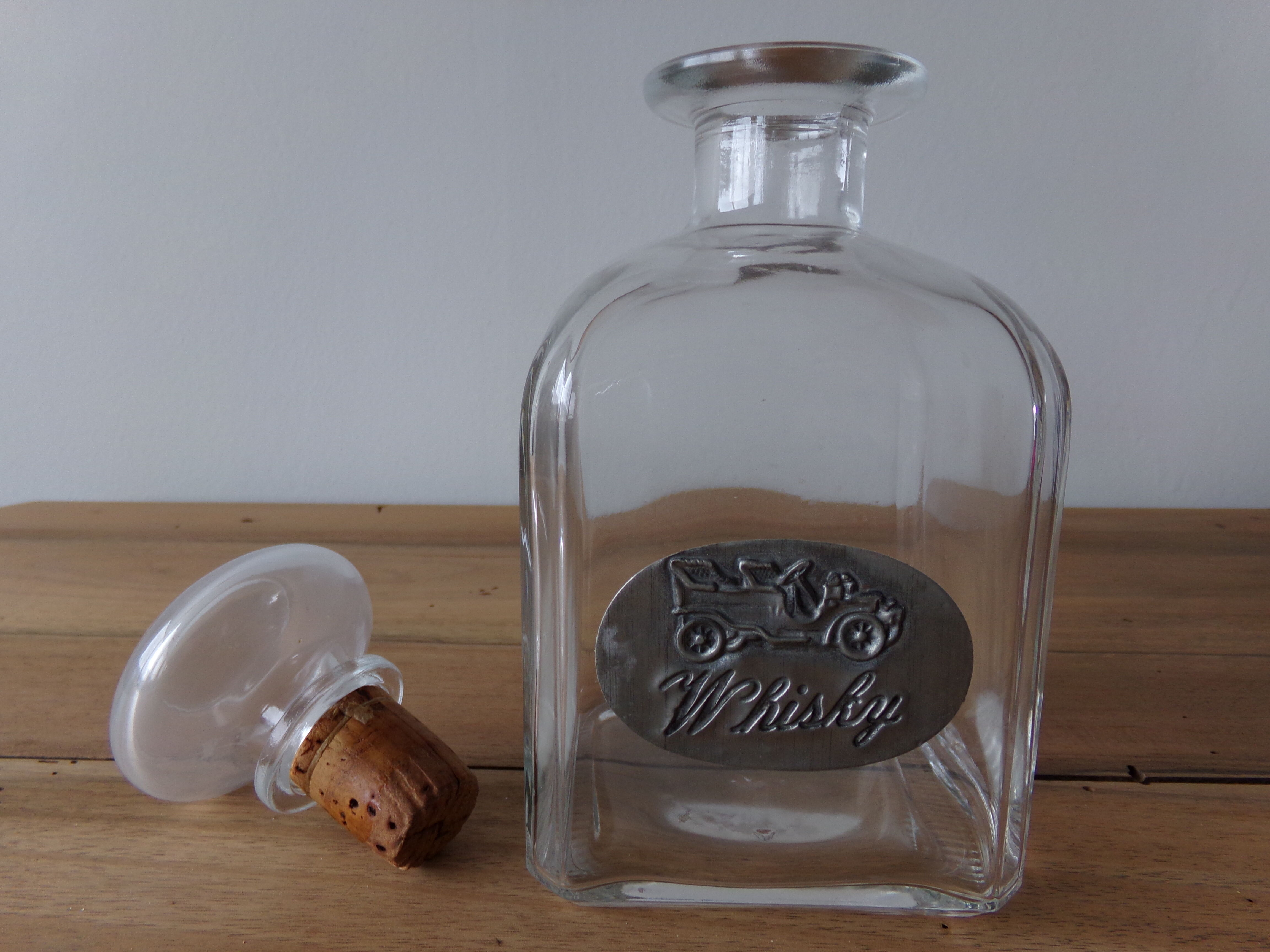 Glass and tin whiskey decanter