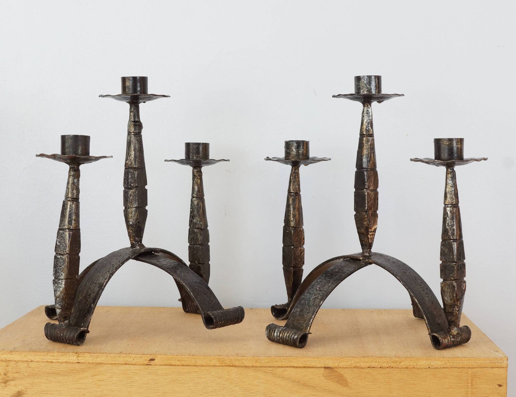 Pair of wrought iron candle holders, 60s