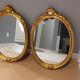 Paire de miroirs oval  doré vintage