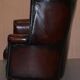 Victorian leather canapé and armchair, barrel back, circa 1860, restored.
