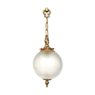 Floral globe and gold metal hanging lamp