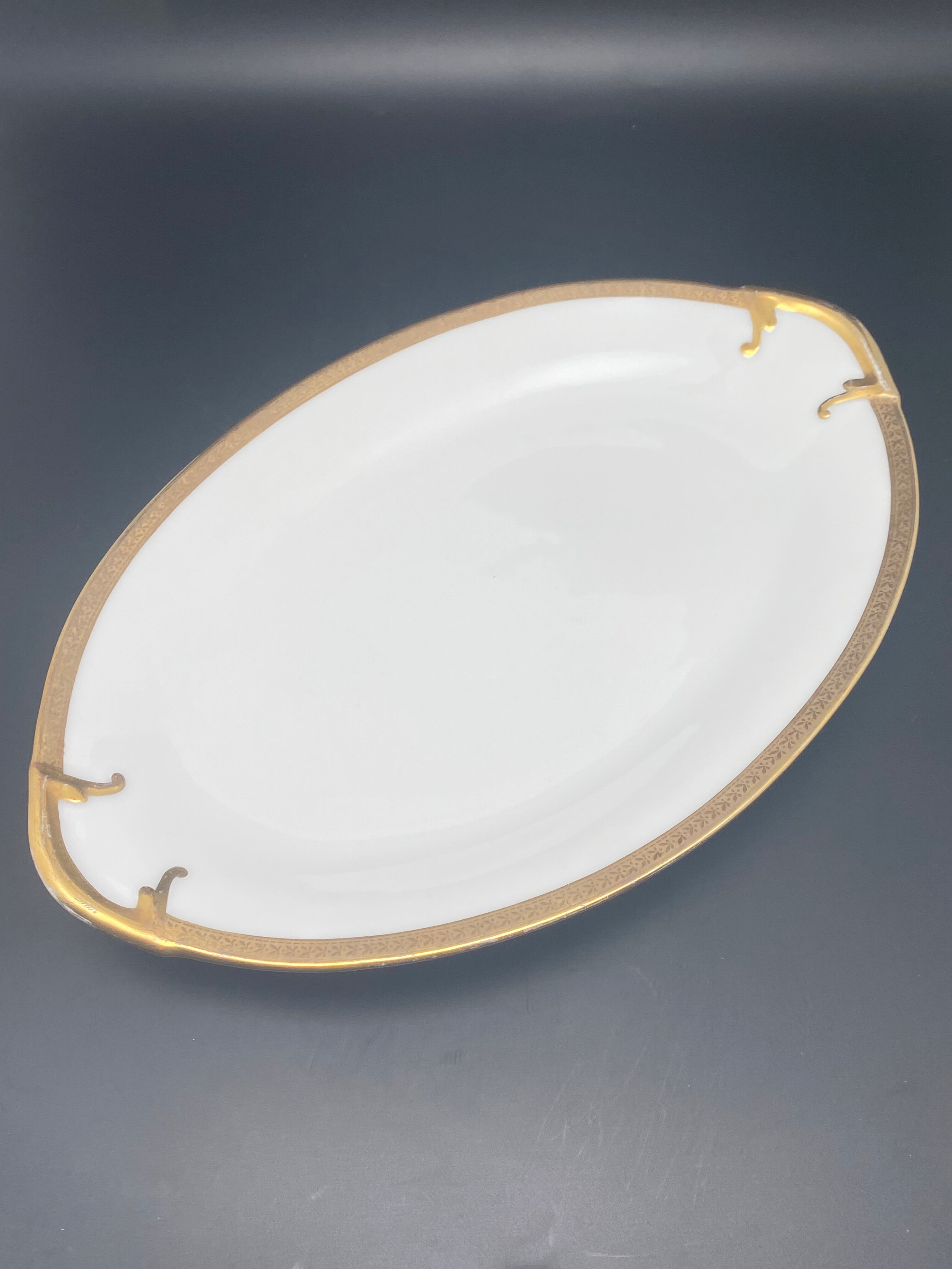Oval flat Limoges golden tower