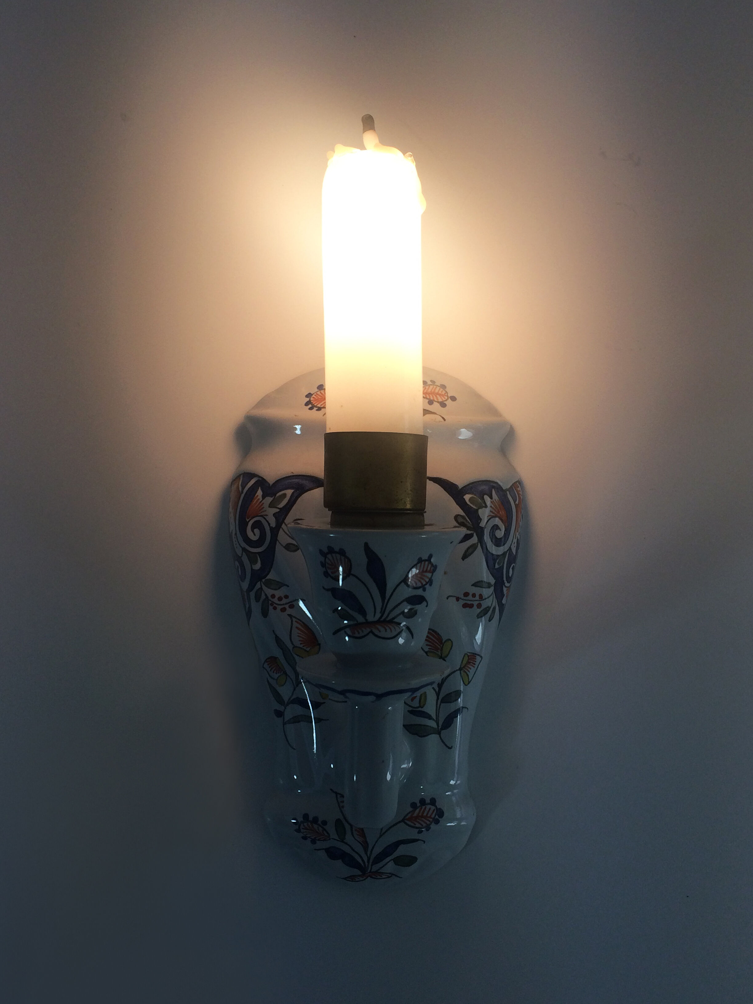 Vintage wall applique in Rouen style earthenware, glass candle