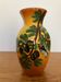 Faience vase Tess Vallauris, decorated with olive trees and a cicada.