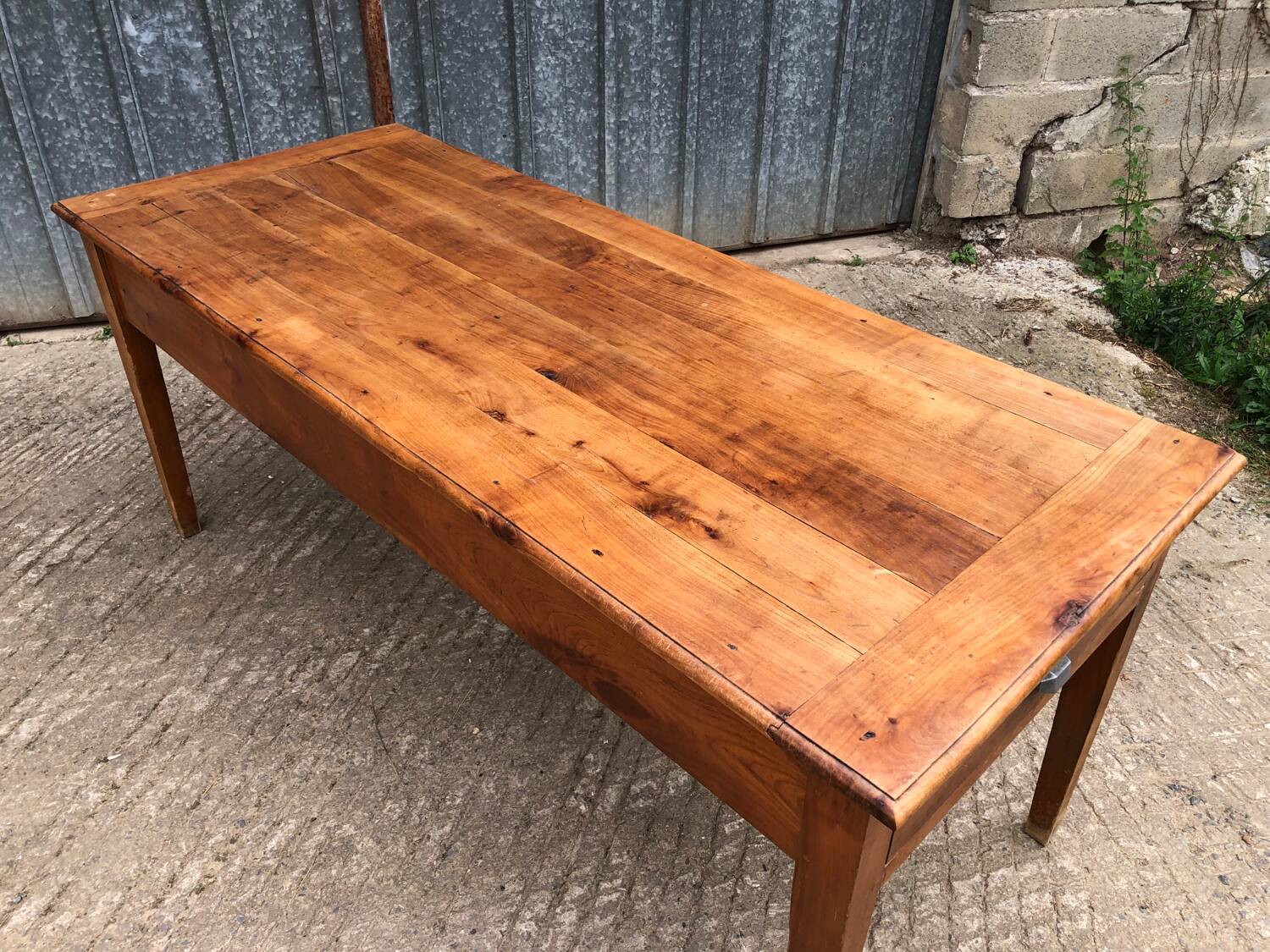 Antique cherry farmhouse table with 2 drawers and 1 pull-out