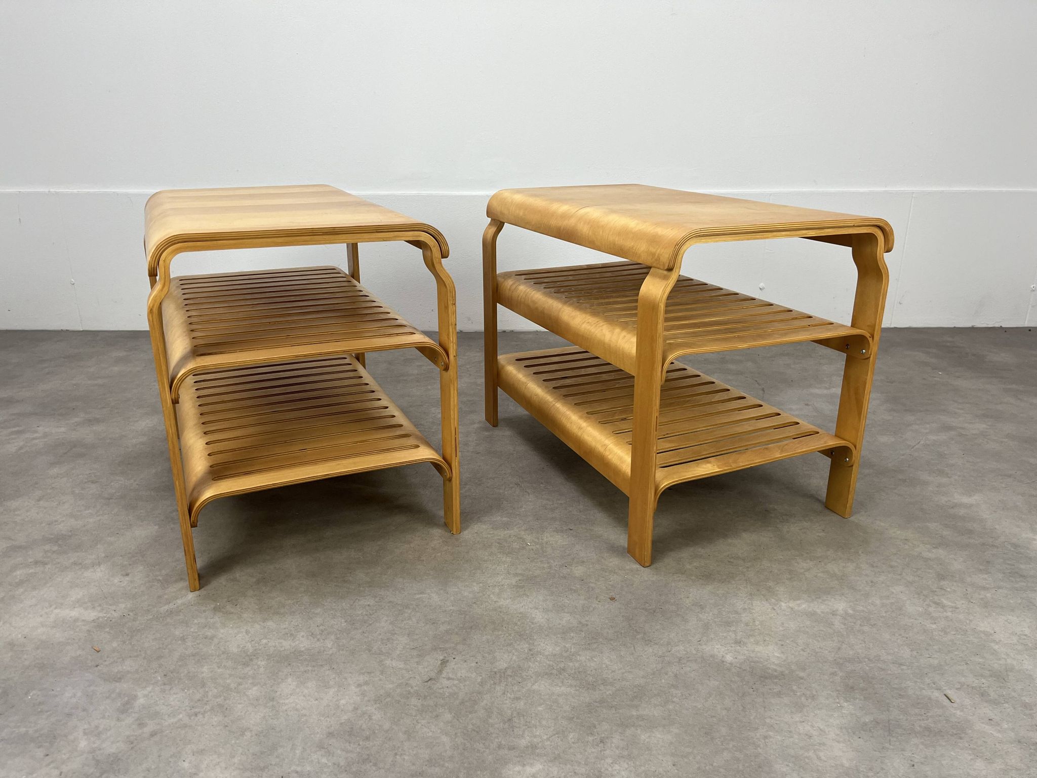 Pair of curved wooden entrance benches 1980