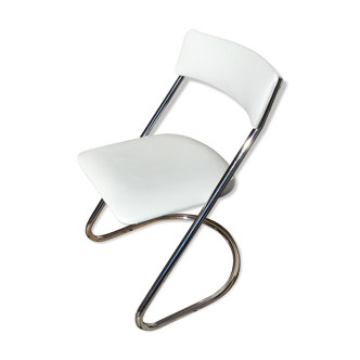 White leather-like sled chair