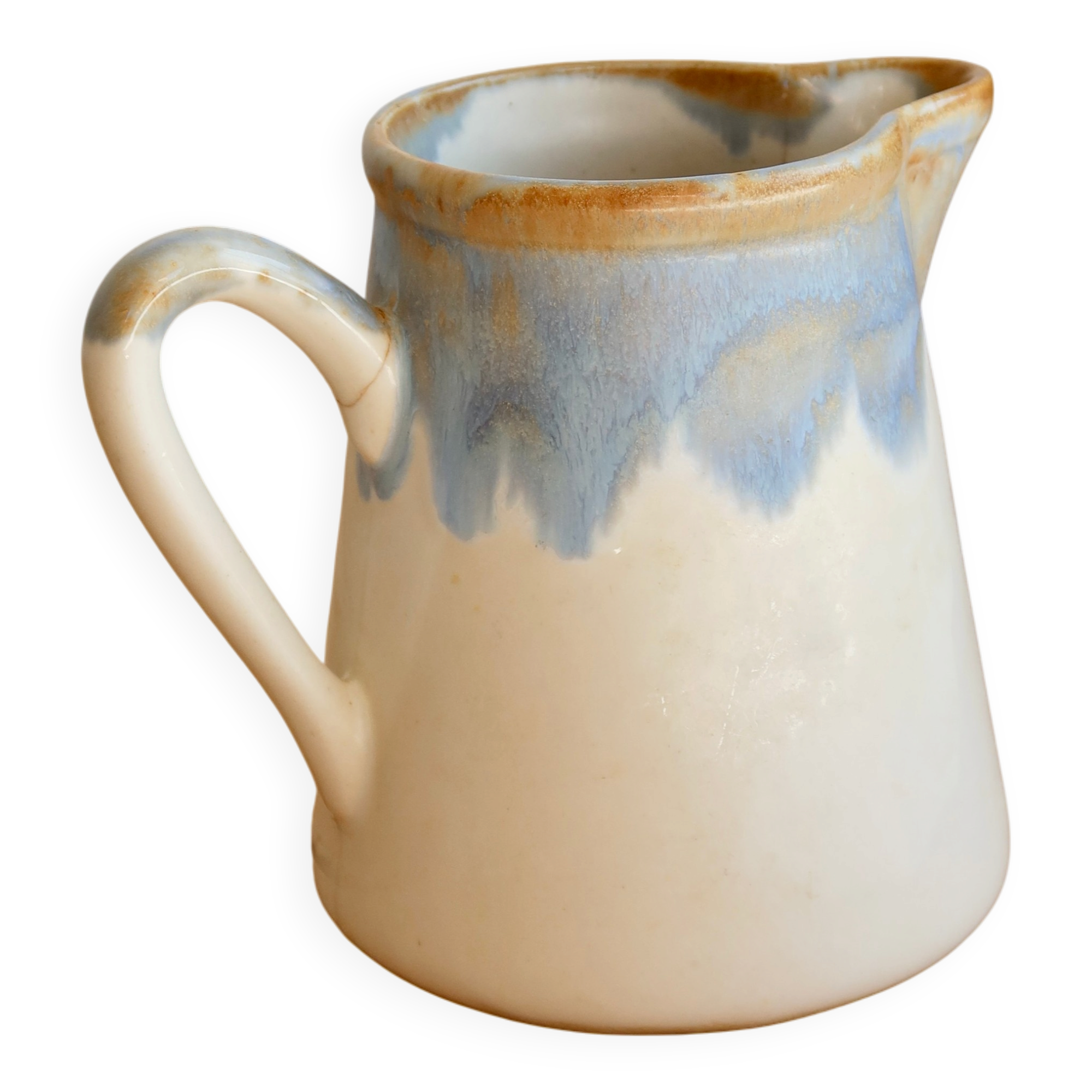Vintage ceramic milk jug with a blue and taupe gradient glaze.