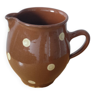 Stoneware pitcher.