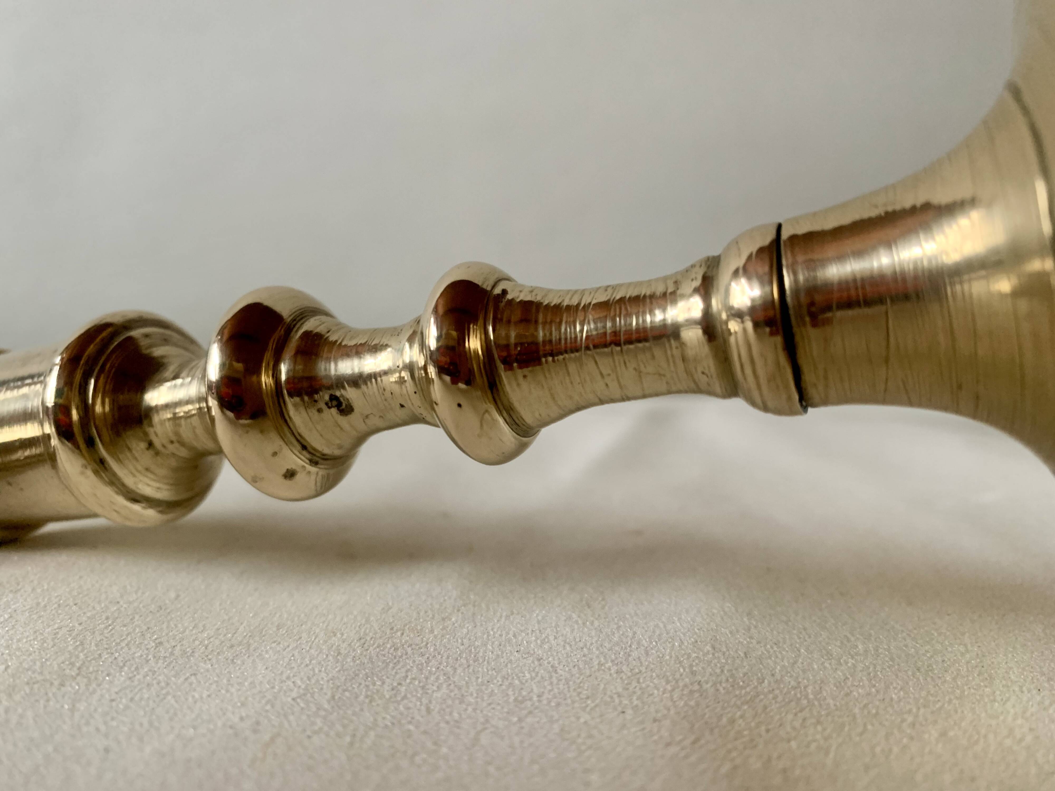 Pair of antique brass candlesticks
