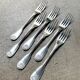 6 Christofle fish forks in silver-plated metal, shell design.