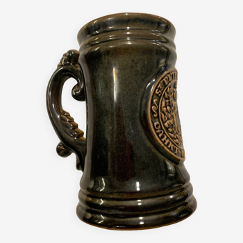 Green earthenware beer mug
