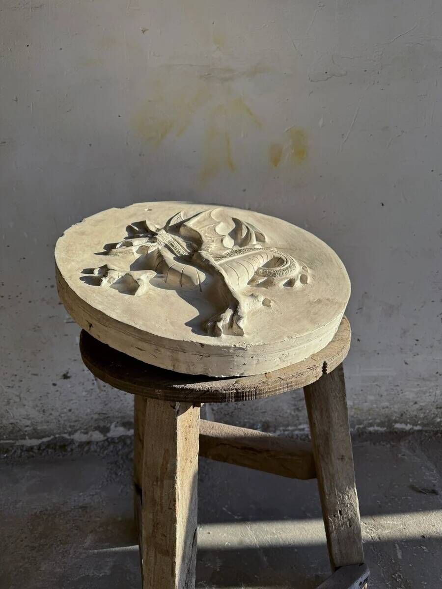 Plaster dragon by Walter De Buck