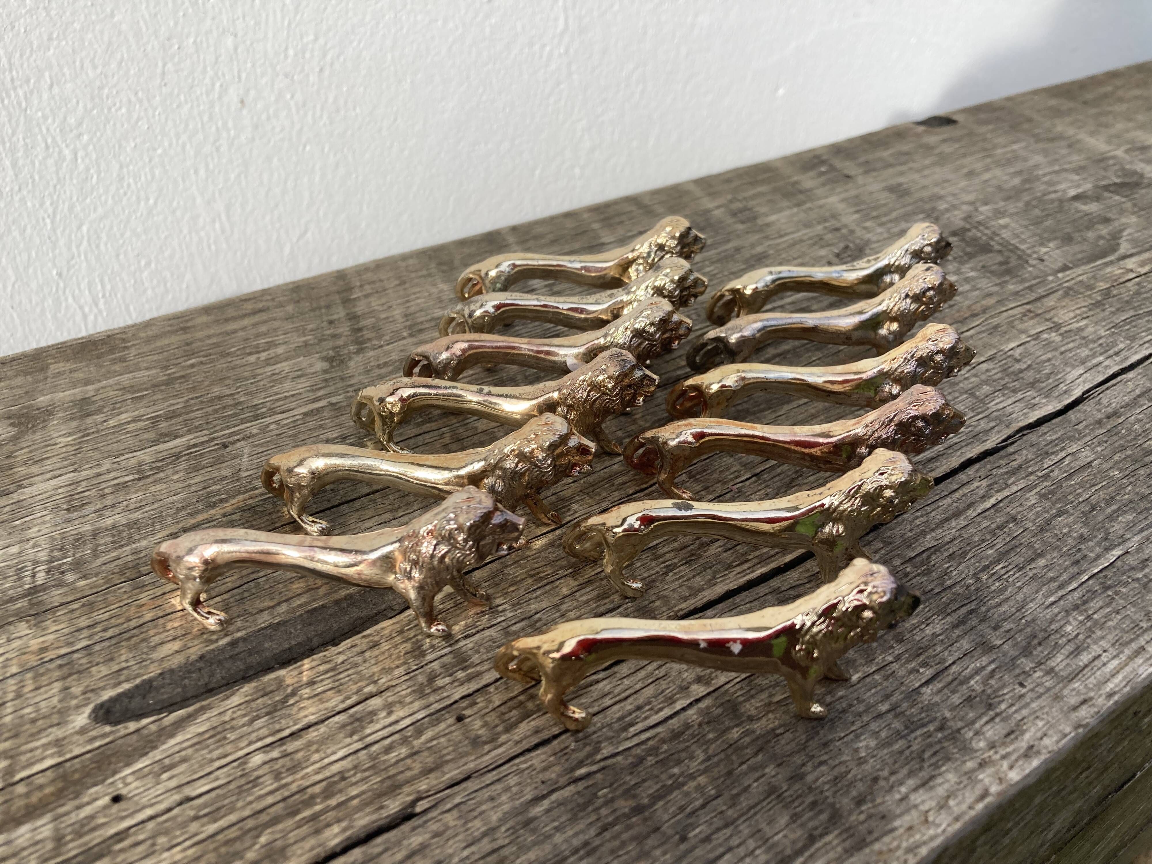 12 vintage gilded gold metal lion animal knife holders