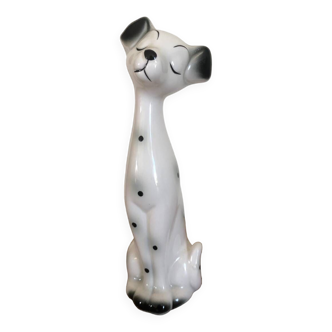 Dalmatian closing his ceramic eyes