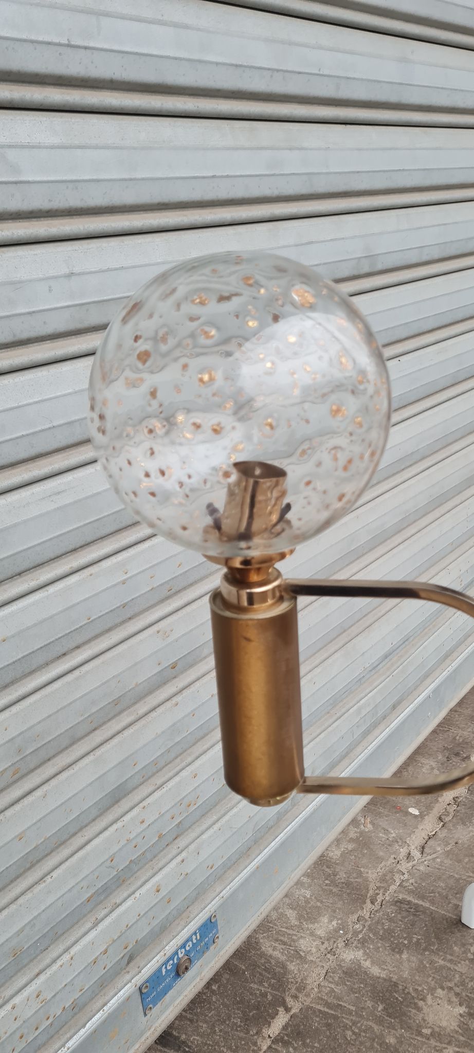 Brass and blown glass chandelier inlaid with gold