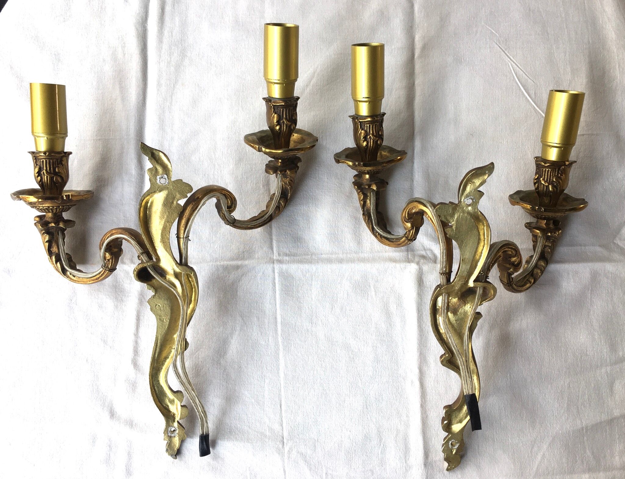 Pair of bronze wall lamps
